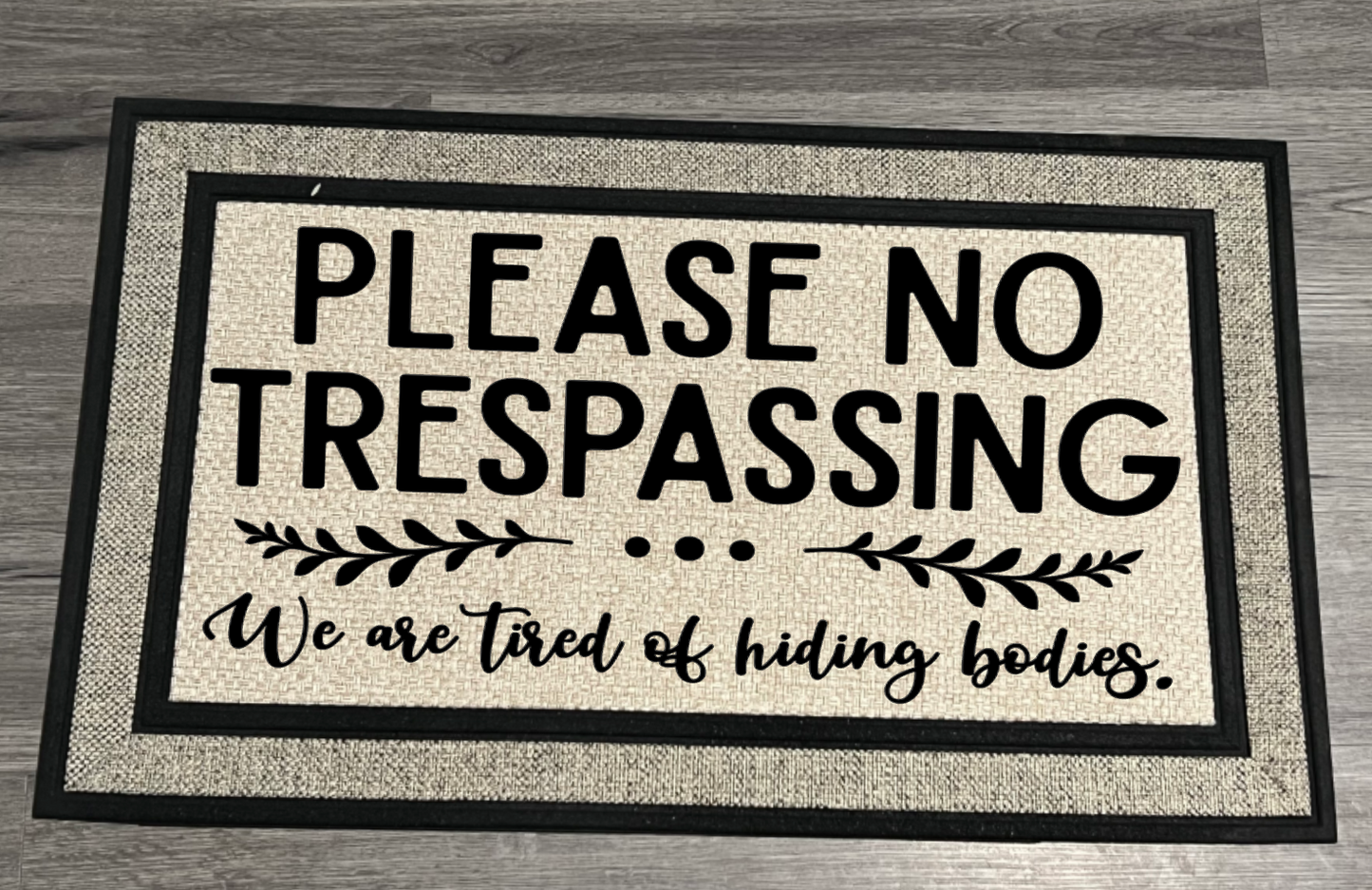 DOOR MAT- NO TRESPASSING W ARE TIRED OF HIDING BODIES